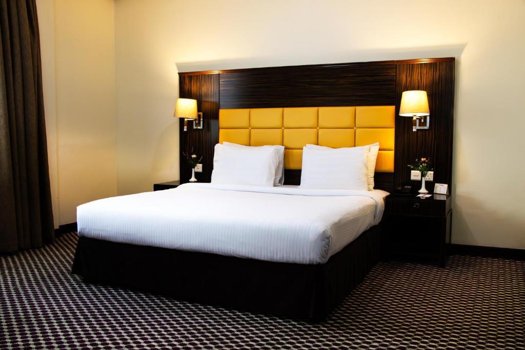 Fortune Karama Hotel - Tap to explore photos