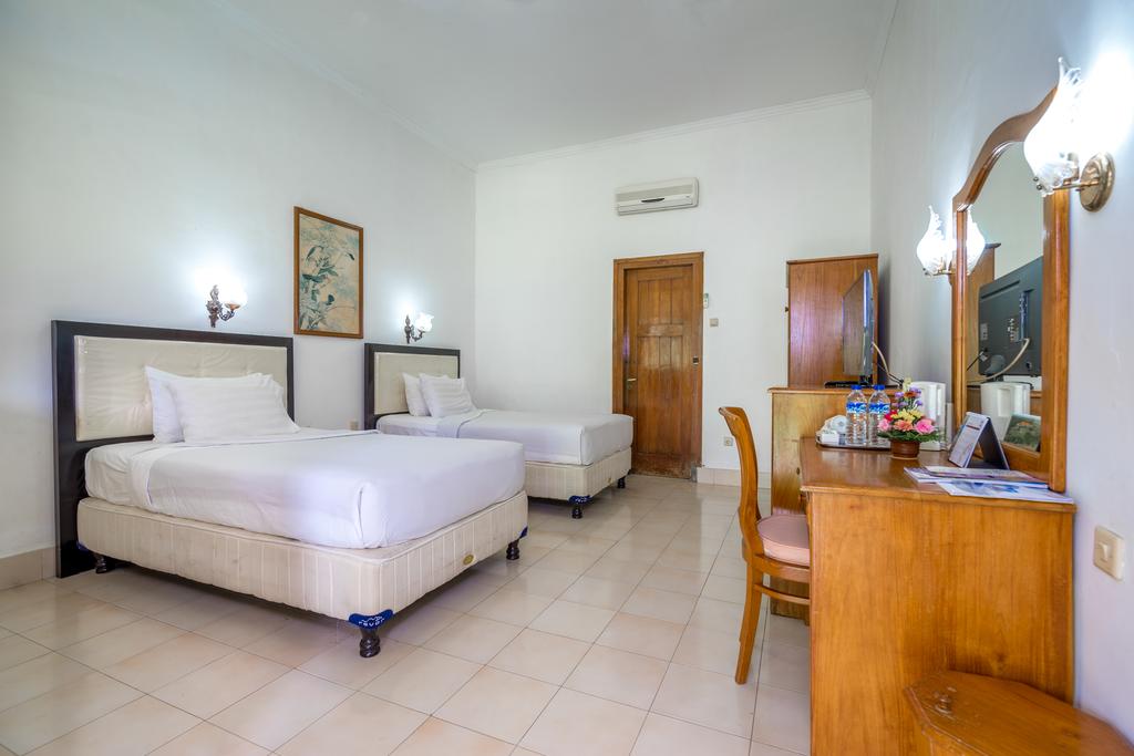 Inna Bali Heritage Hotel - Tap to explore photos