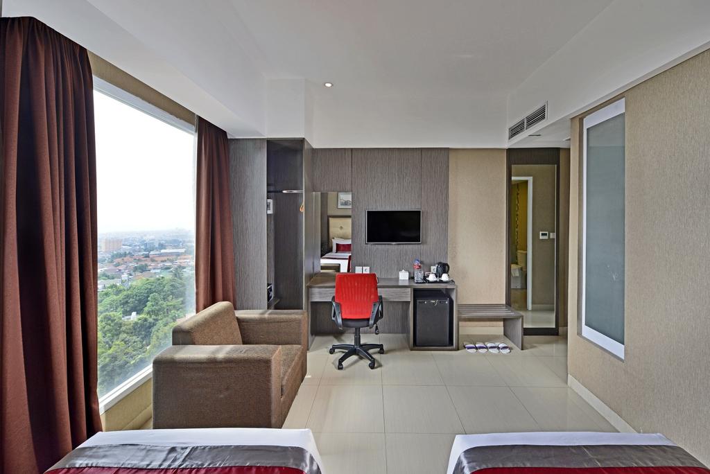 Travello Hotel Bandung - Tap to explore photos