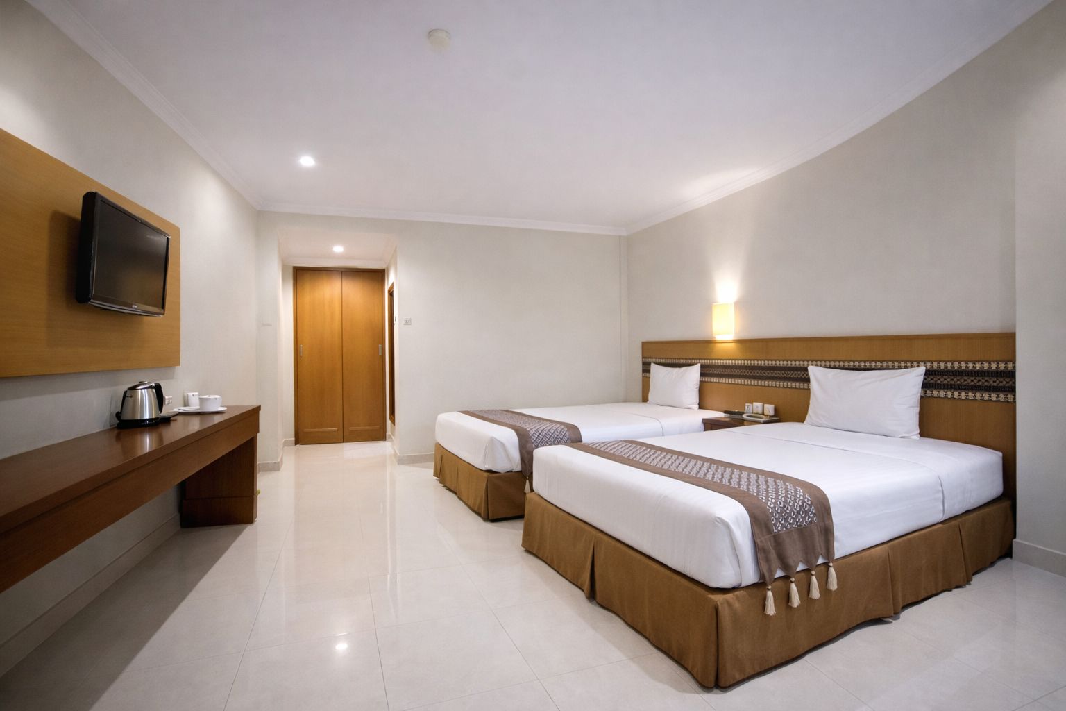Cakra Kembang Hotel - Tap to explore photos