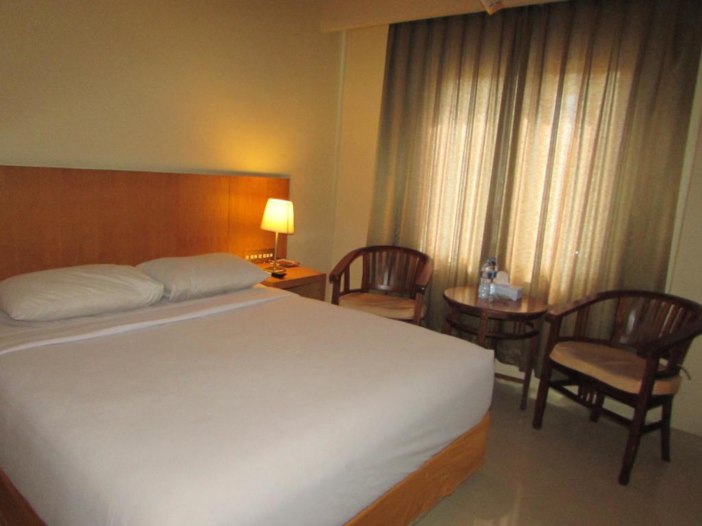 Hotel Wisata - Tap to explore photos