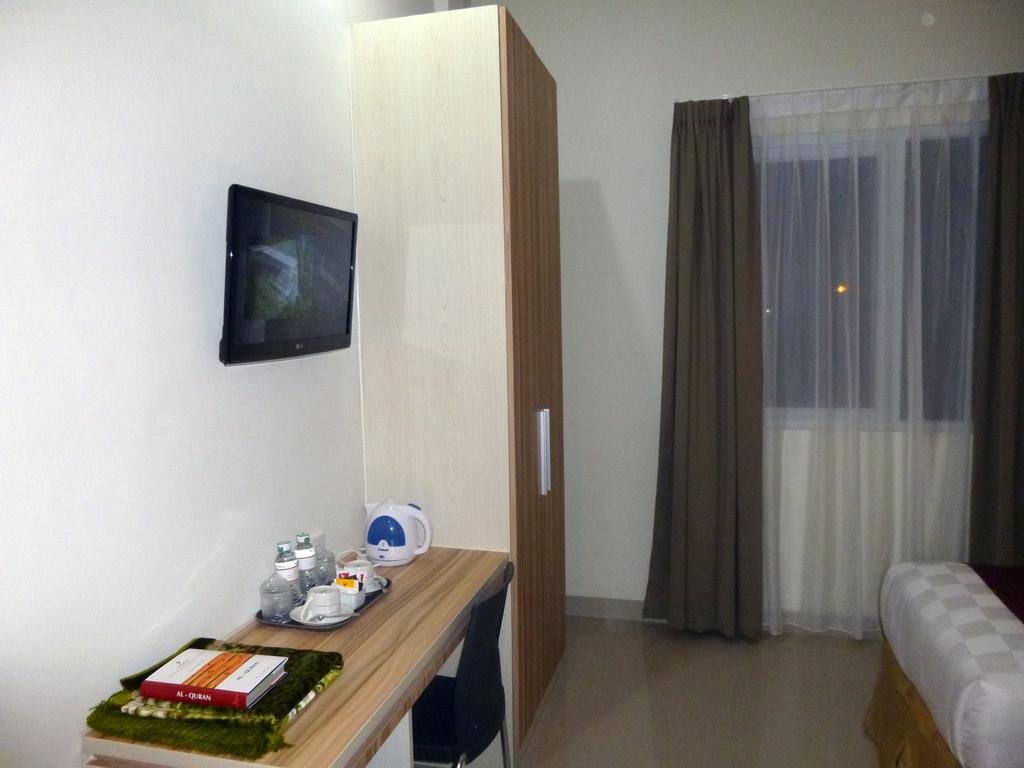 Rangkayo Basa Halal Hotel - Tap to explore photos
