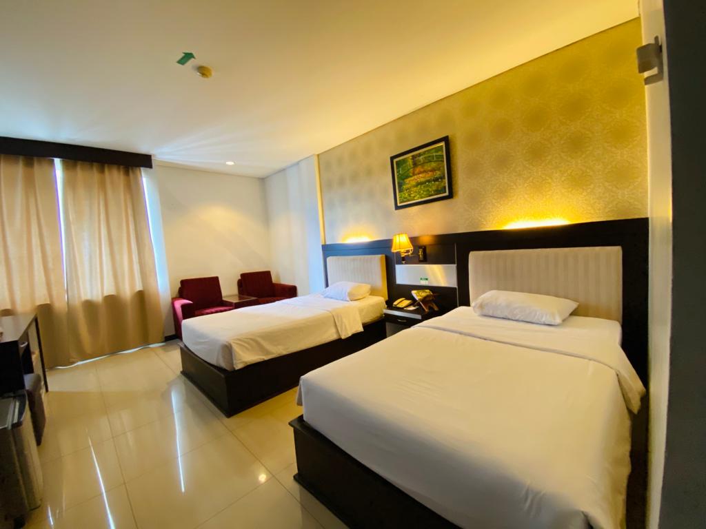 Zahra Syariah Hotel - Tap to explore photos