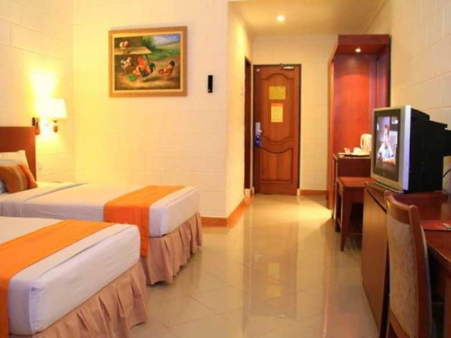 Hotel Mega Lestari - Tap to explore photos