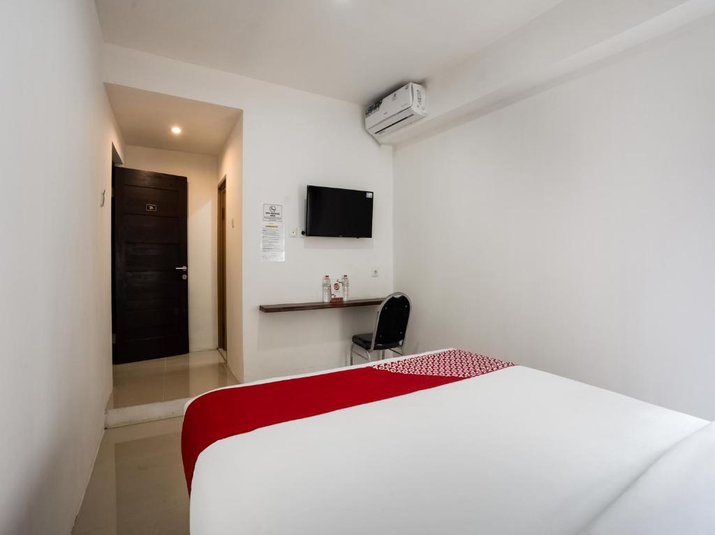 Capital O 3463 Cimahi Guest House - Tap to explore photos
