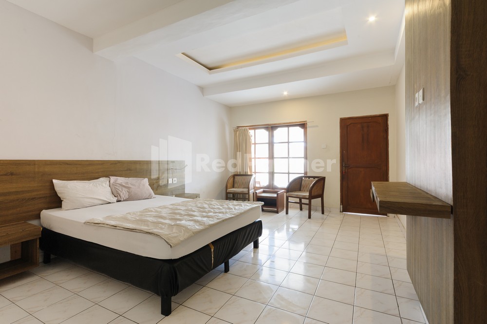 Pulau Bali Hotel Denpasar Mitra RedDoorz - Tap to explore photos