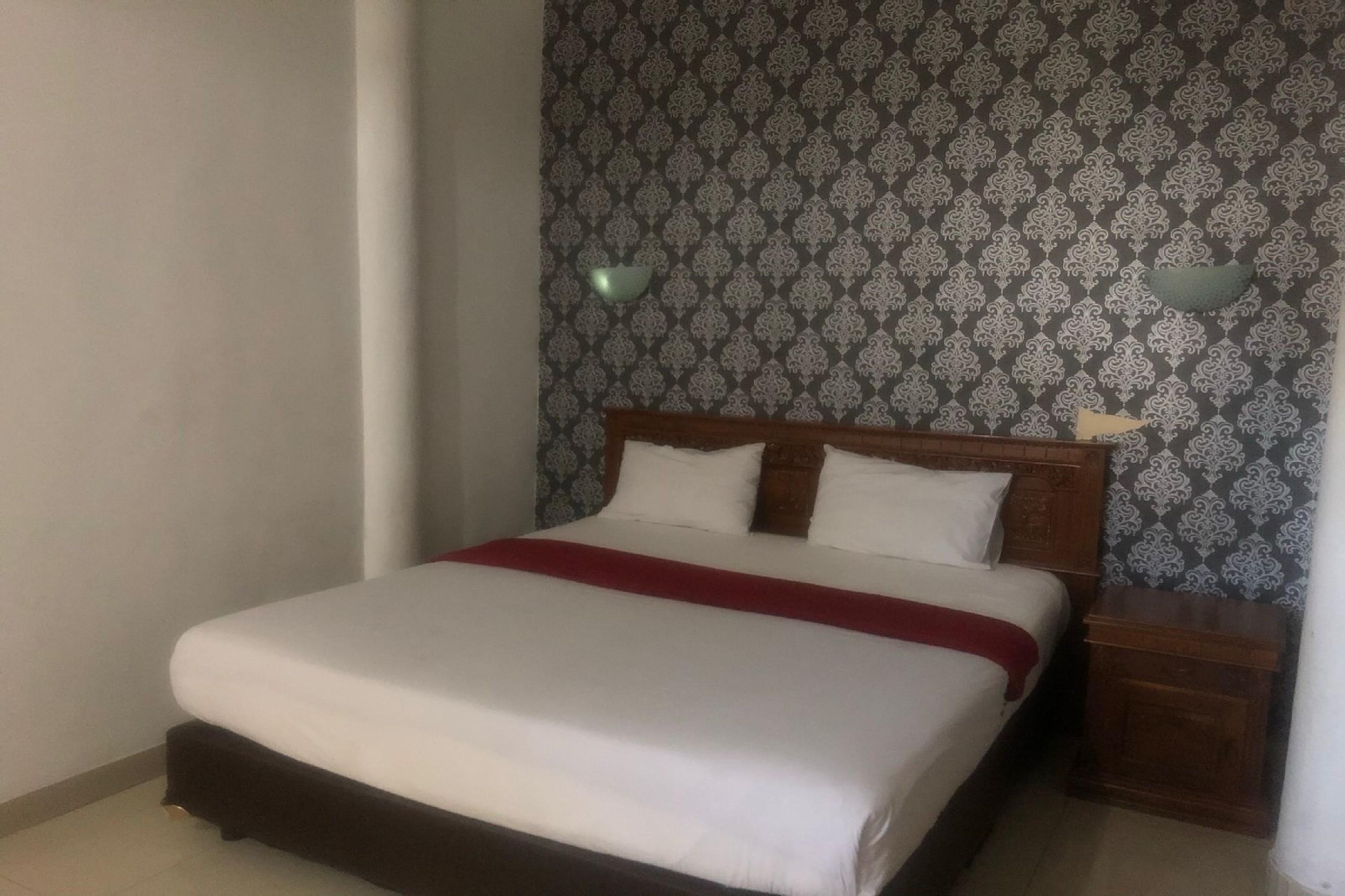 Hotel Abna Sangatta Mitra RedDoorz - Tap to explore photos