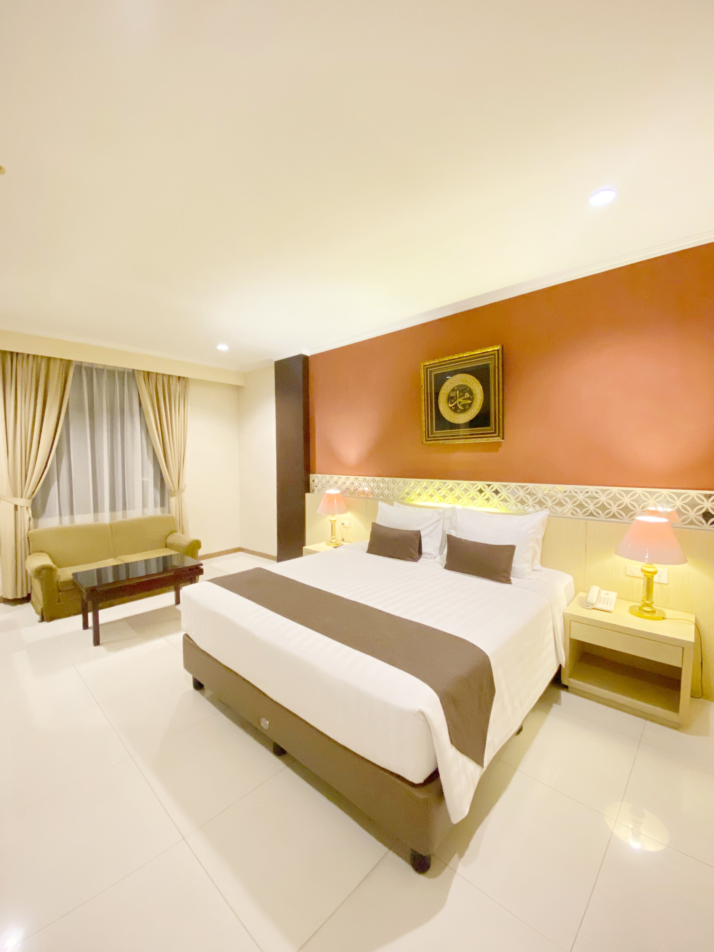 The Amrani Syariah Hotel - Tap to explore photos