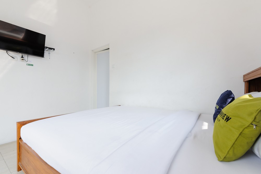Urbanview Hotel Sky Batu Malang by RedDoorz Room Type - Deluxe Room