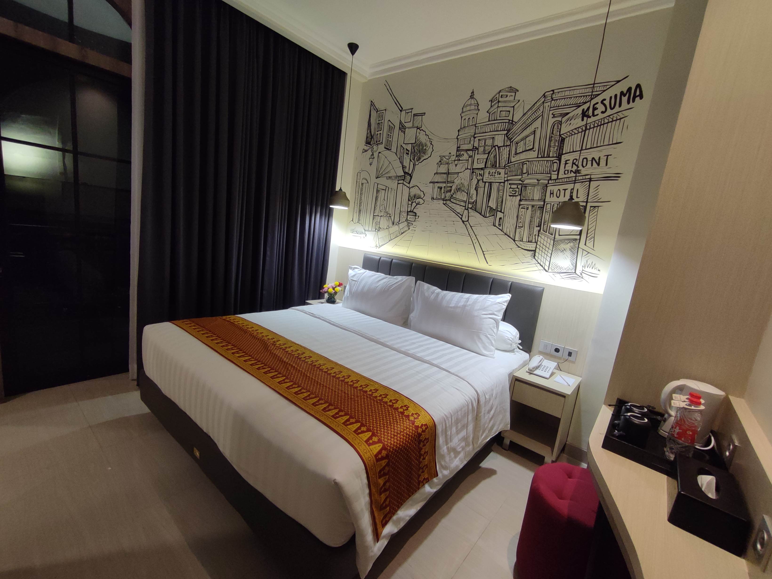 Kesuma Front One Boutique Hotel - Tap to explore photos