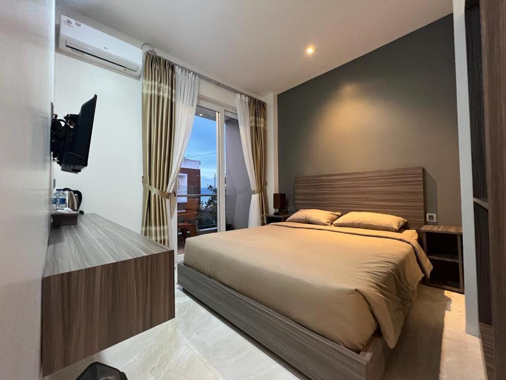 PURNAMA BALIGE HOTEL Room Type - Deluxe Room