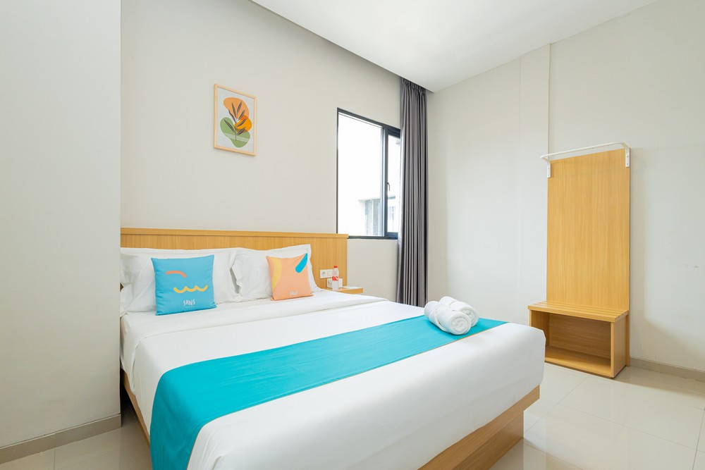 Sans Hotel Bobosini Malang by RedDoorz Room Type - Family Room
