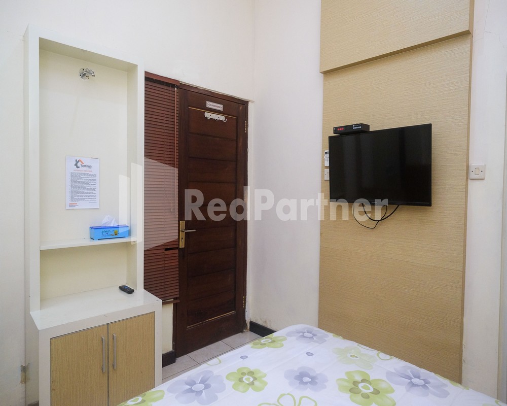 Tatti Inn Syariah Seturan RedPartner - Tap to explore photos