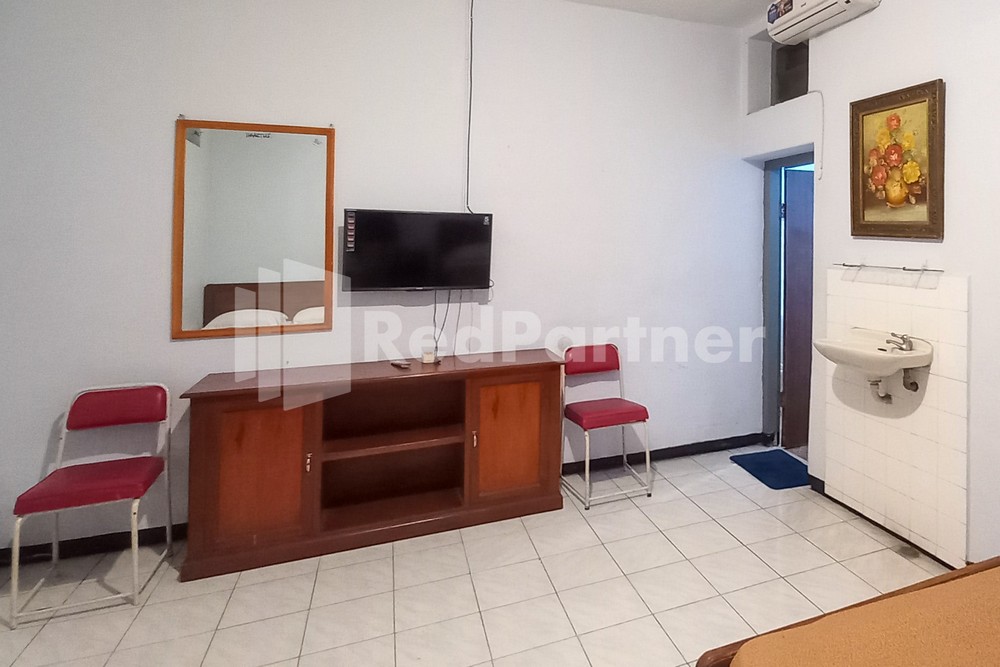 Hotel Palem 1 Syariah RedPartner - Tap to explore photos