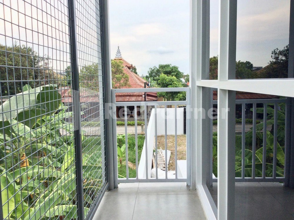 Tebluess Guesthouse Gianyar RedPartner - Tap to explore photos