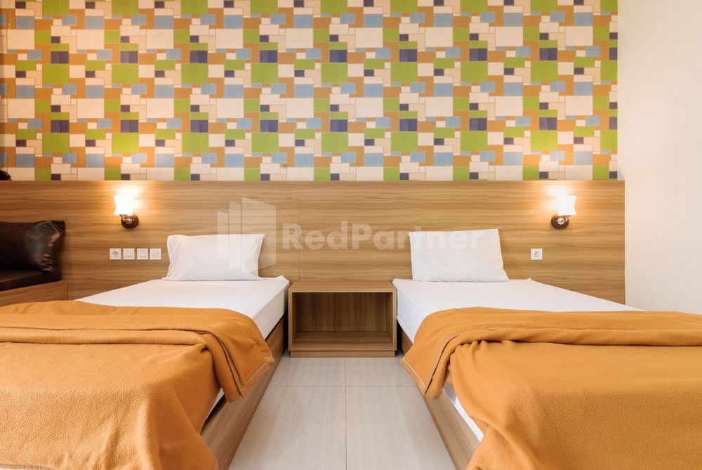 Deluma Hotel Syariah RedPartner Room Type - Deluxe Twin Room
