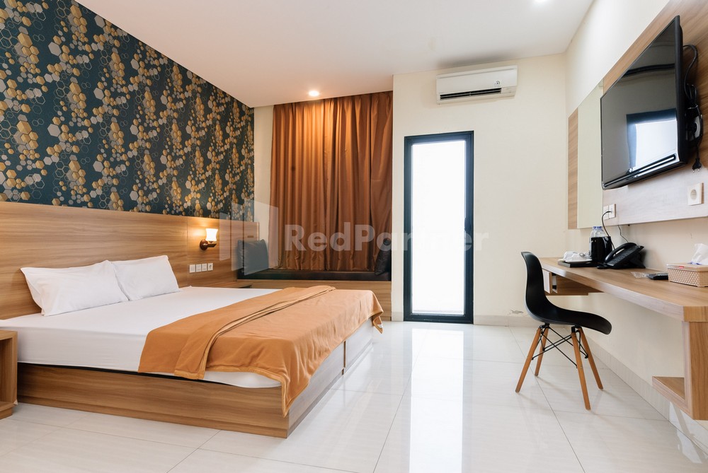 Deluma Hotel Syariah RedPartner Room Type - Deluxe Room