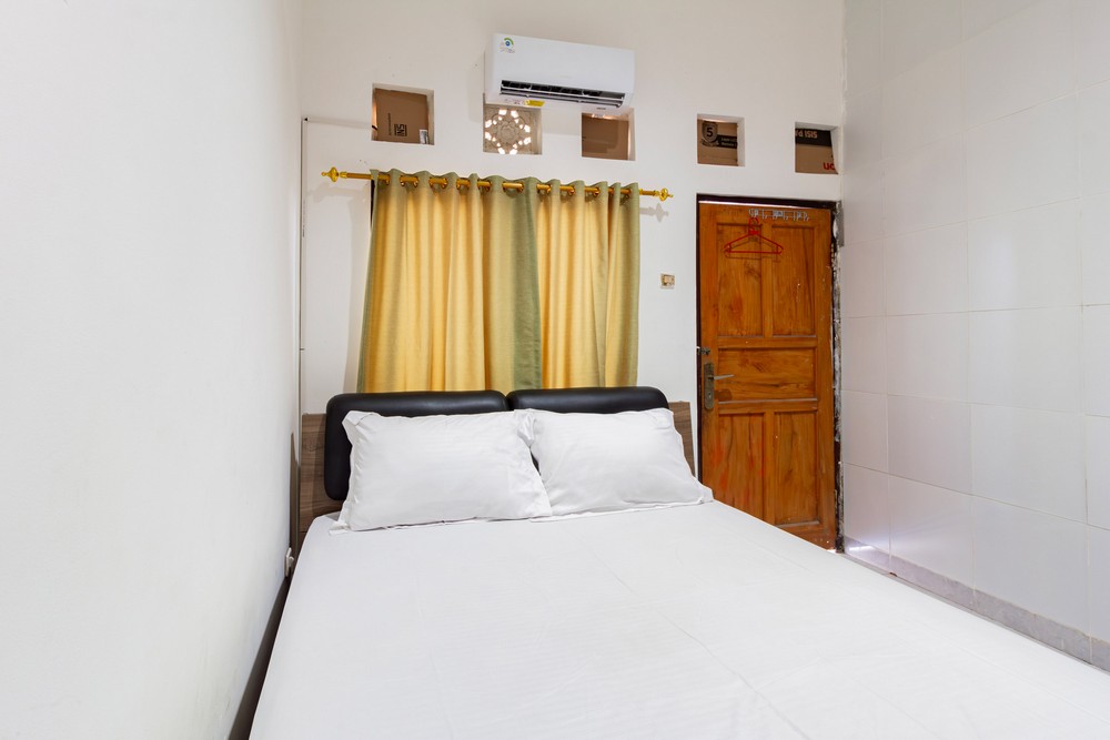 SN Guest House Near Trans Studio Mall Bali - Tap to explore photos