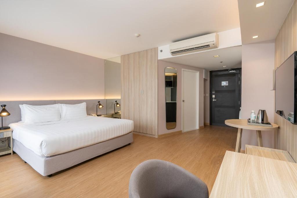 Aster Hotel and Residence - Tap to explore photos